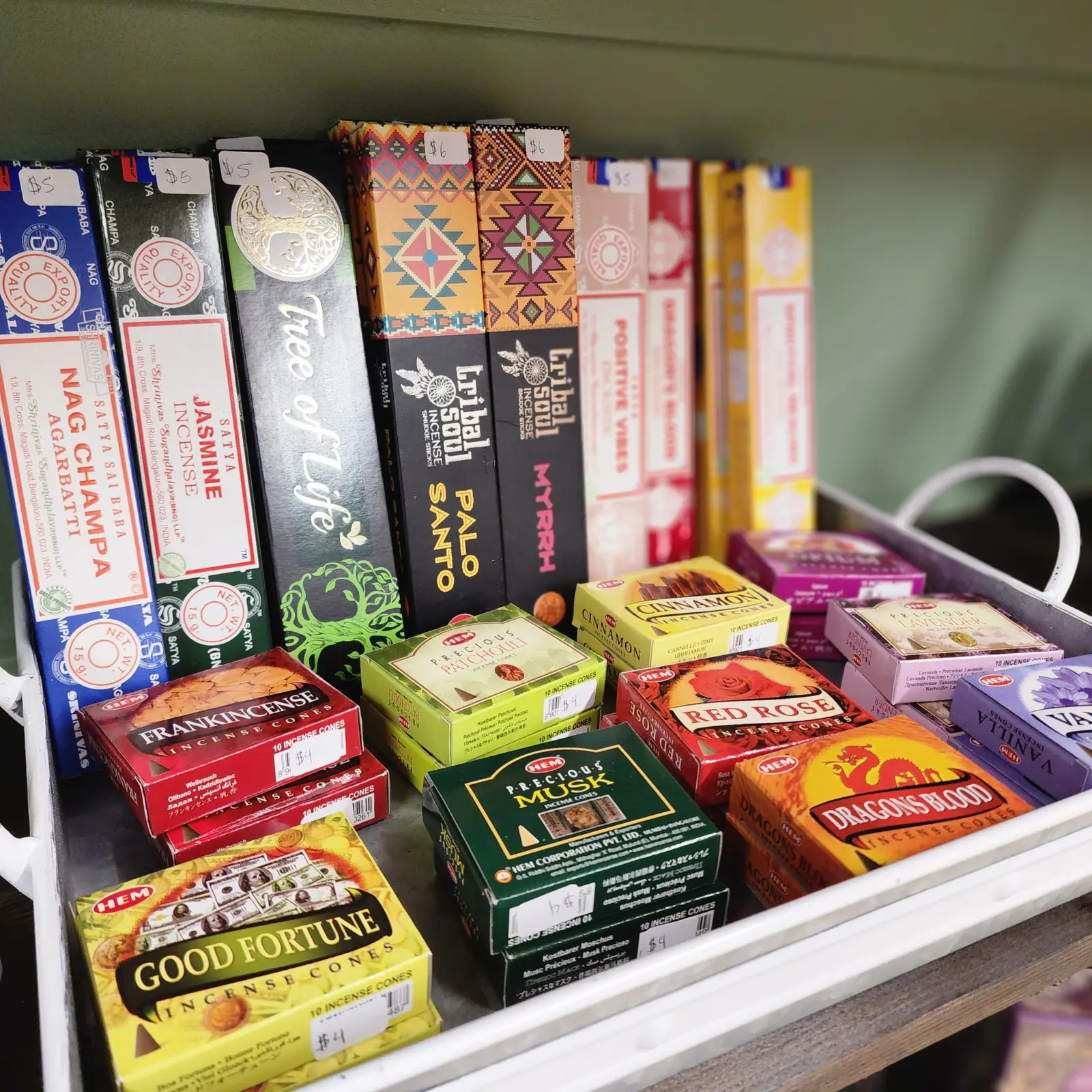 Boxes of incense on a shelf at Indigo Thrive