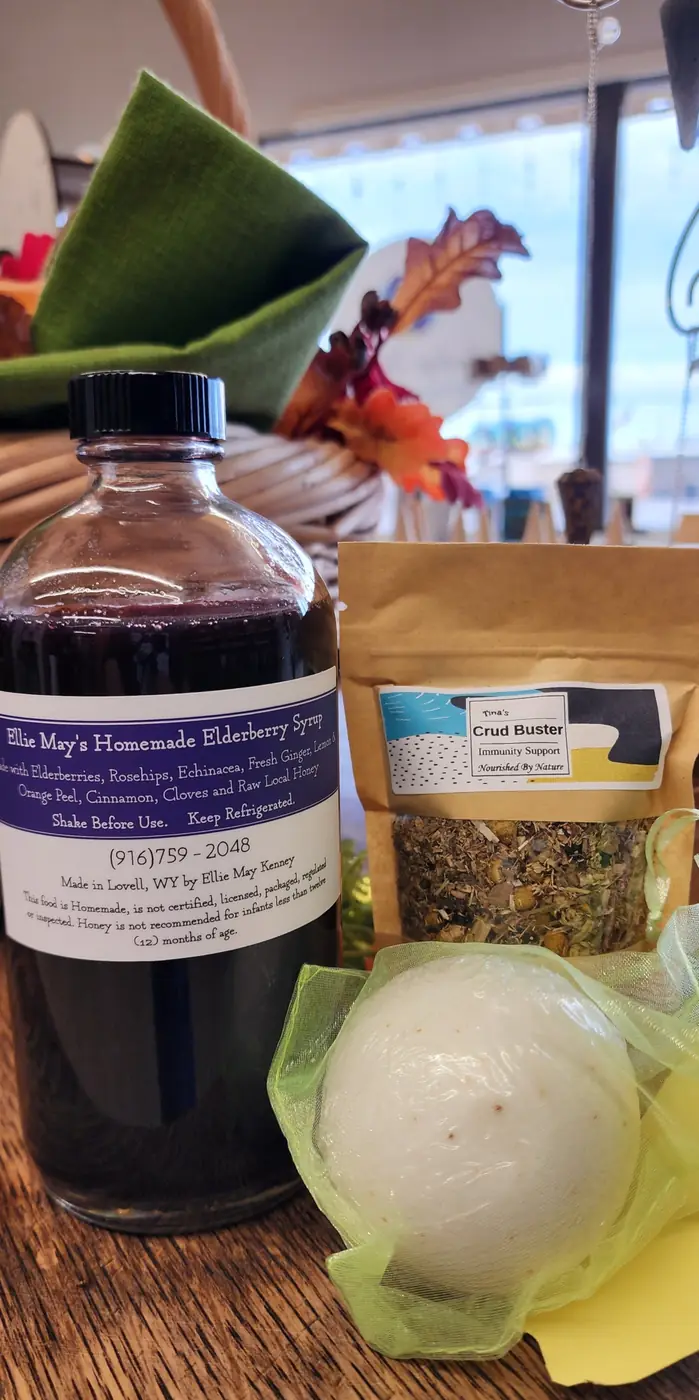 Locally made elderberry syrup and a bath bomb